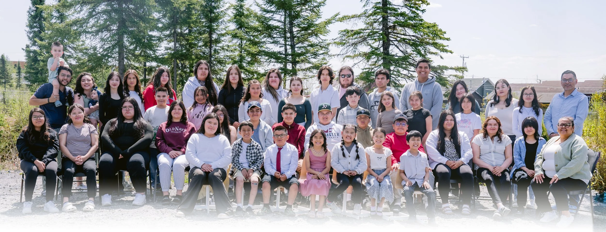 Students and teachers of Dabwetamun Academy gathered outside for the 2025 class photo